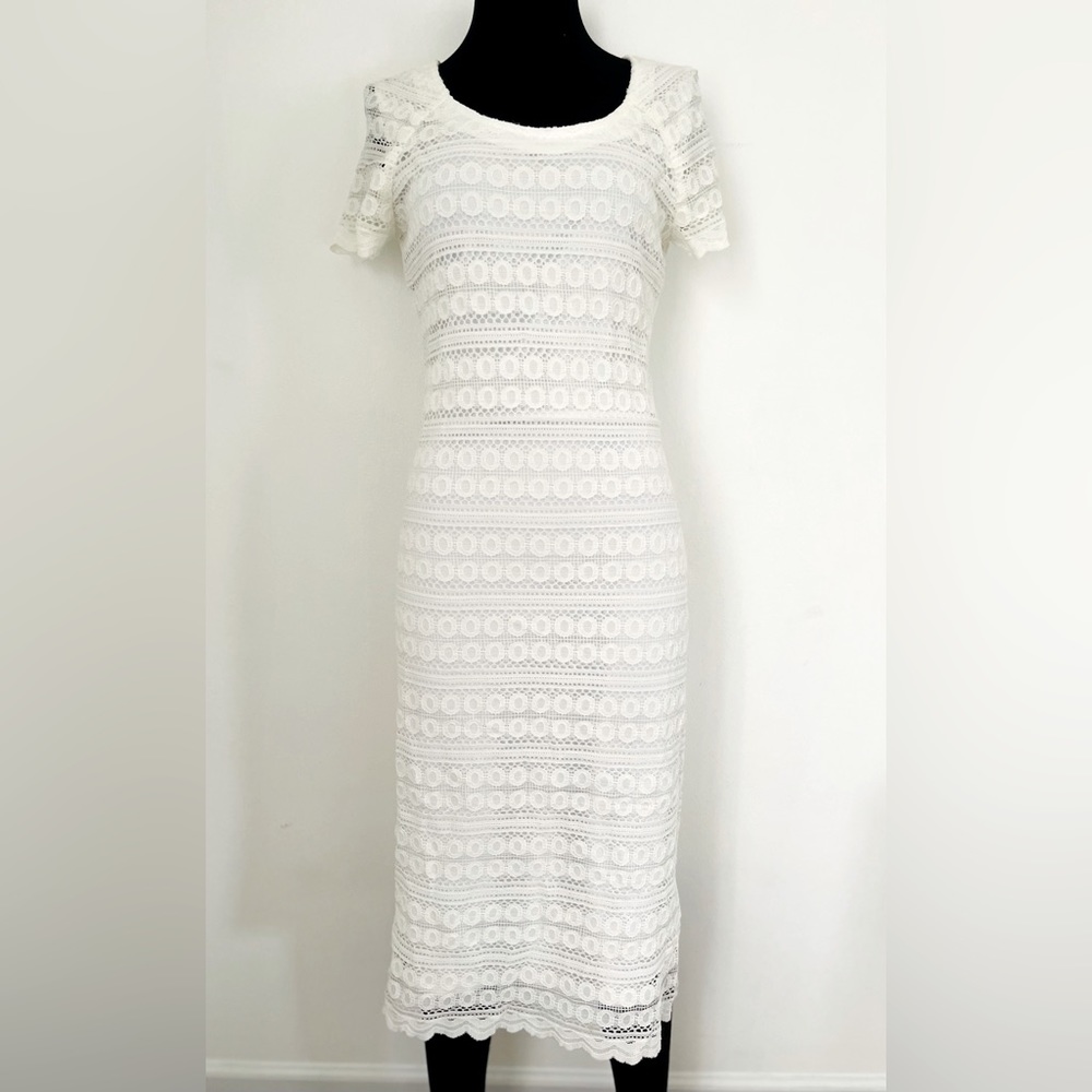 Easter White Dress. Size 6. Runs small. Never worn. Lace on top of slip.